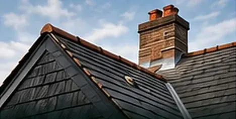 Slate roof and brick chimney